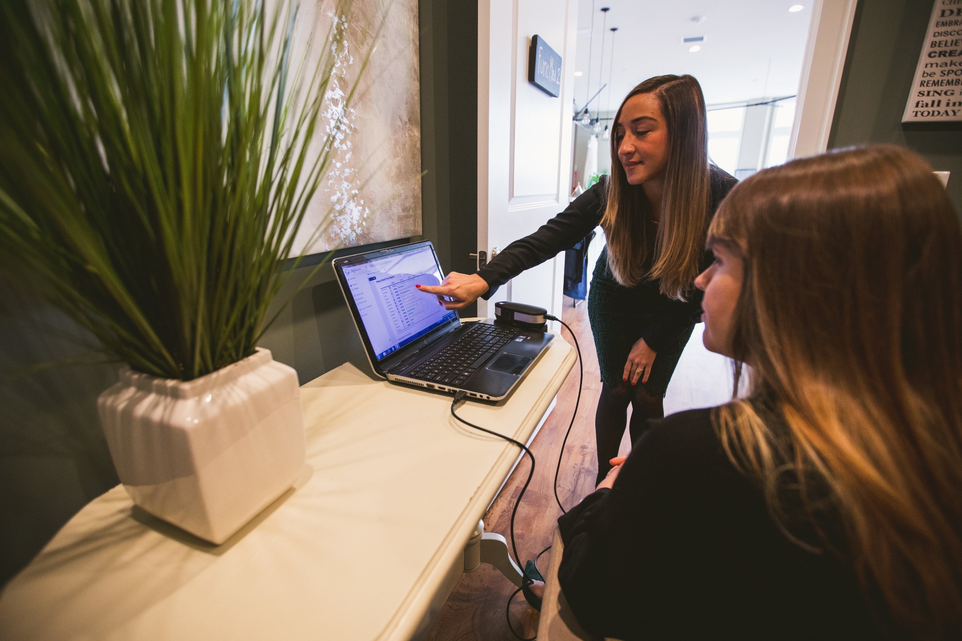 Dr. Nicole Rivera reviewing a member's lab data