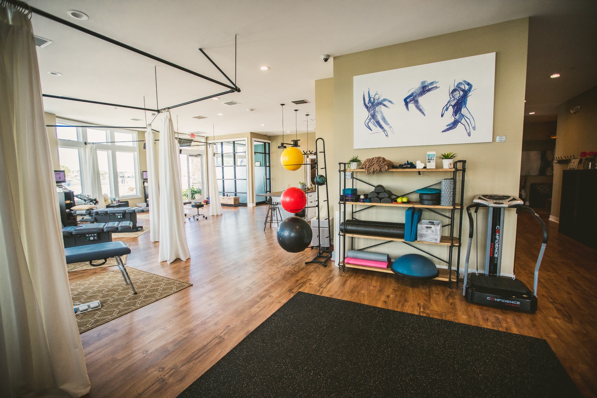 Movement and rehab studio at IWG Belmar — stability balls, vibration plate, fascial work