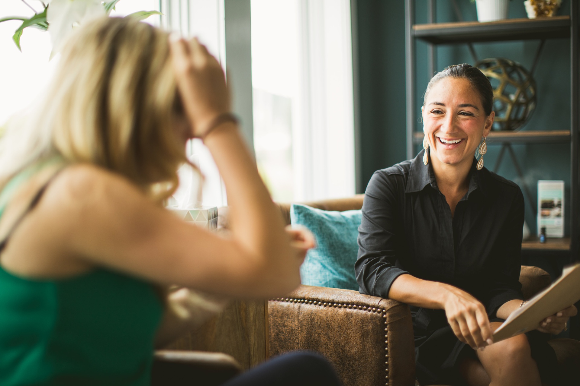 Dr. Nicole in conversation with a client