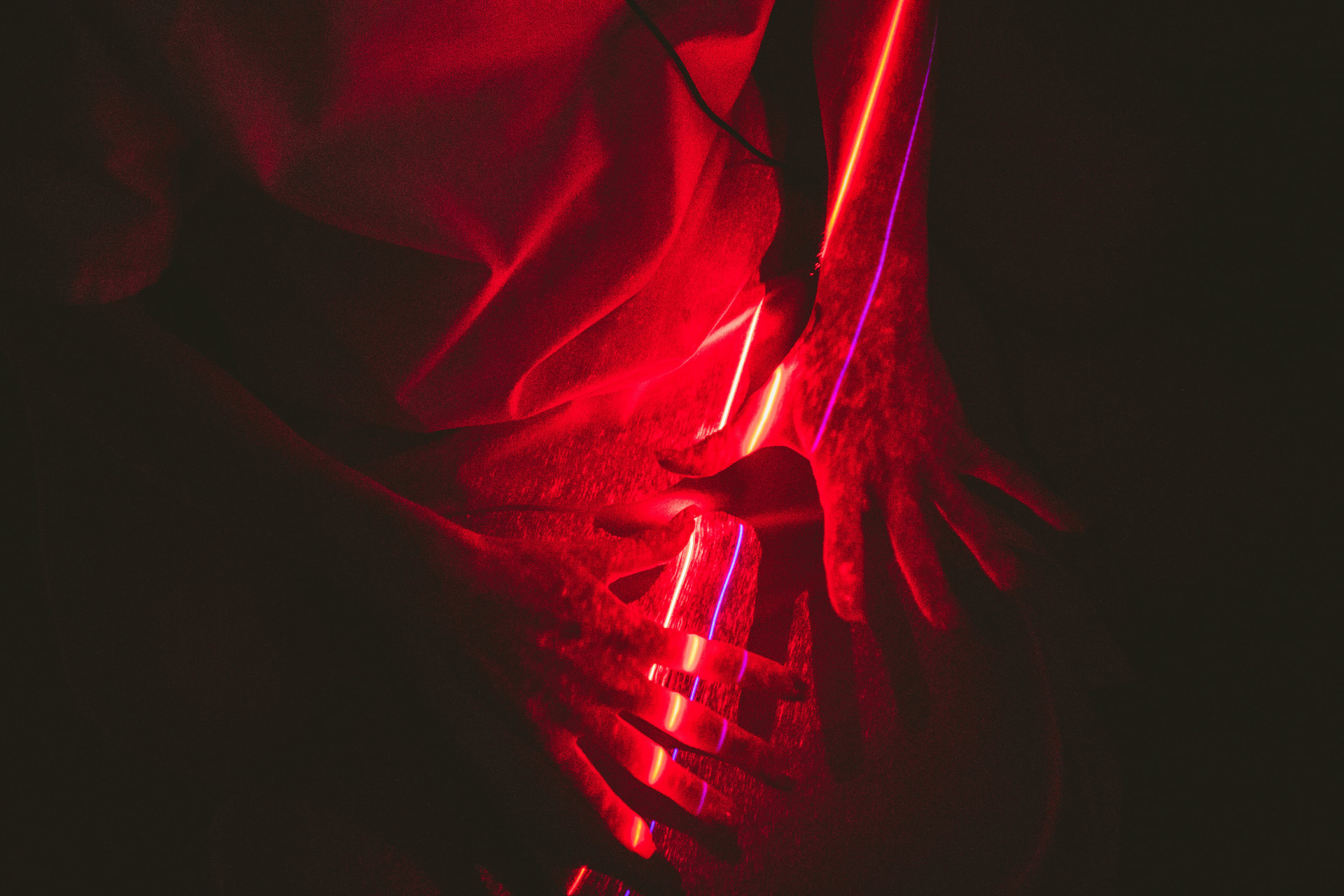 Red and near-infrared light laser therapy applied to a guest's arm